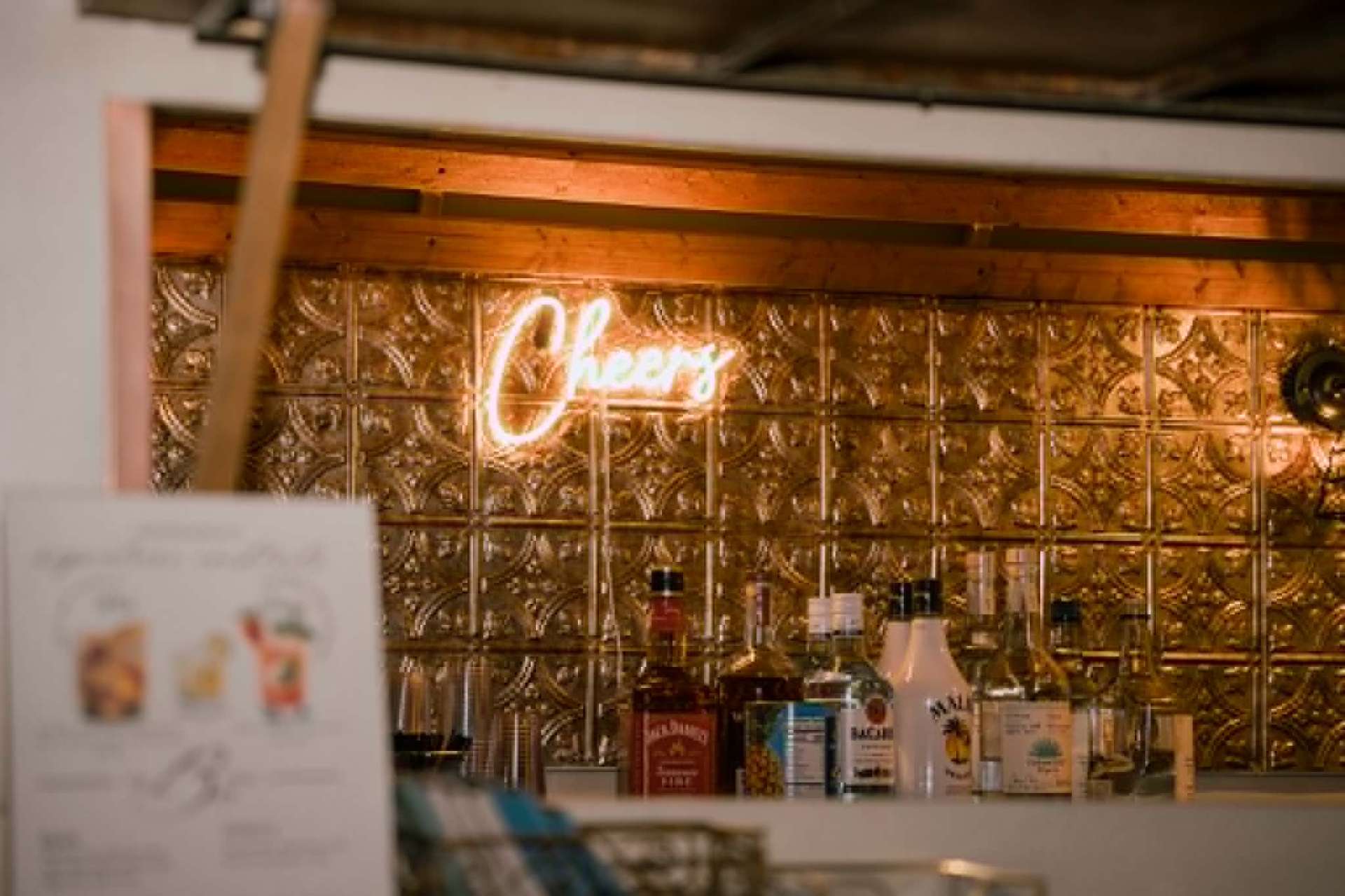 Bartender pouring a craft cocktail